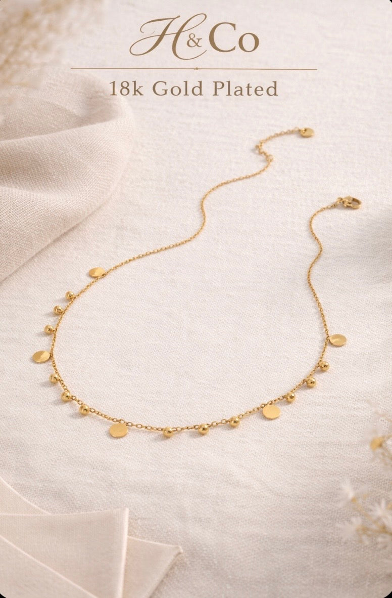 WATER-DROP NECKLACE WITH DISC & BEAD CHARMS