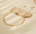 WATER-DROP NECKLACE WITH DISC & BEAD CHARMS