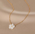 FLOWER SHELL AND 18k GOLD BEAD NECKLACE